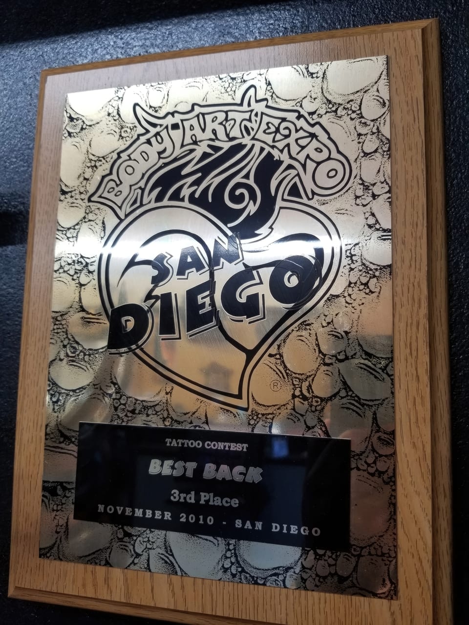 A framed Body Art Expo plaque reads "Best Back" and "Third Place."